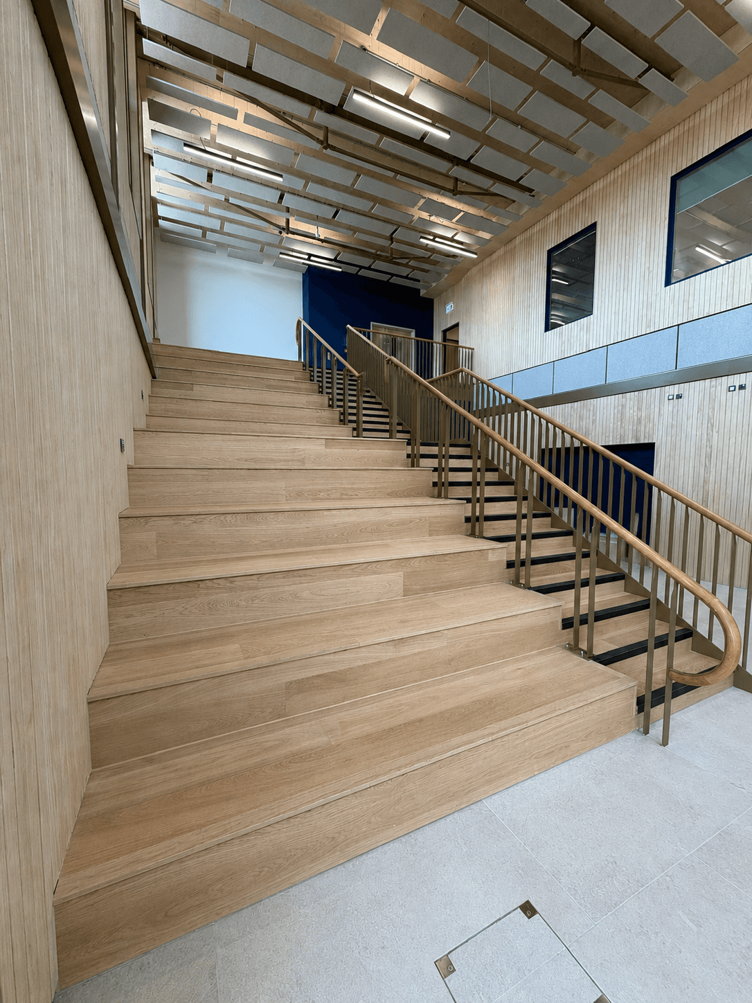 Wide timber staircase installed in an education building