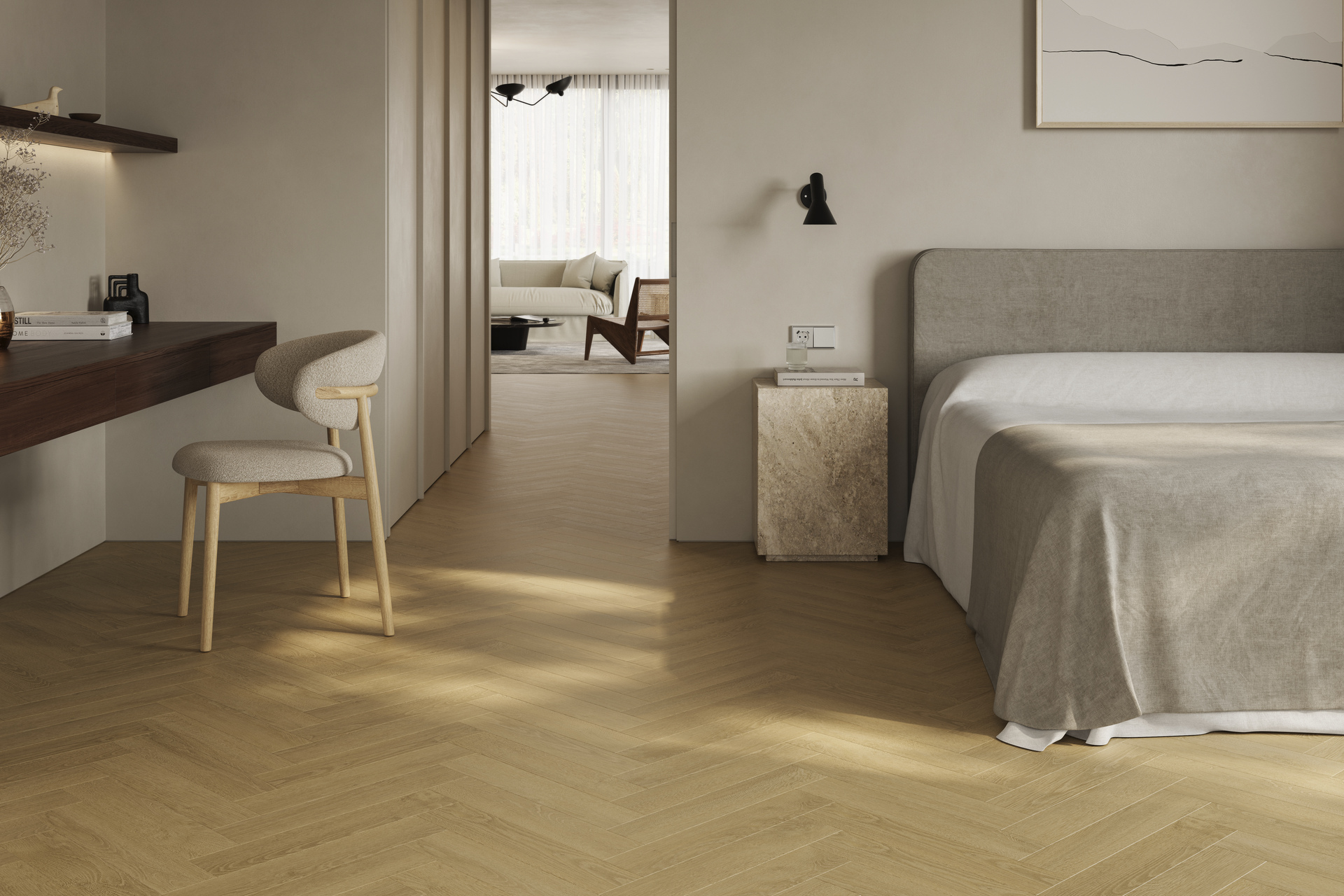 Hotel bedroom with light herringbone wood-effect flooring